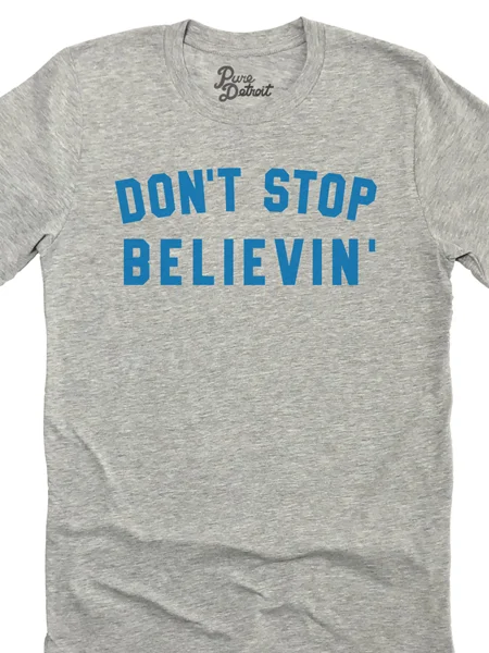Don't Stop Believin' Unisex T-shirt - Blue / Athletic Gray Denim Fabric Leather Fabric Suede Fabric Don't Stop Believin' Unisex T-shirt - Blue / Athletic Gray Denim Fabric Leather Fabric Suede Fabric